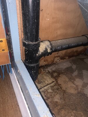 Pipe running up to ceiling