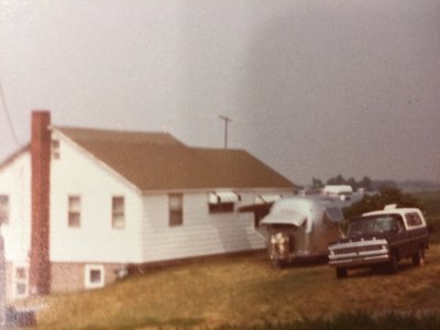 Grandparent’s house in Ripley, NY, 1971 Ford F-250, 1976 Airstream 27’. If you could see past the left side of the house, you would see Lake Erie in the distance.